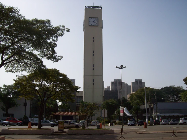 the large tower has a clock at the top