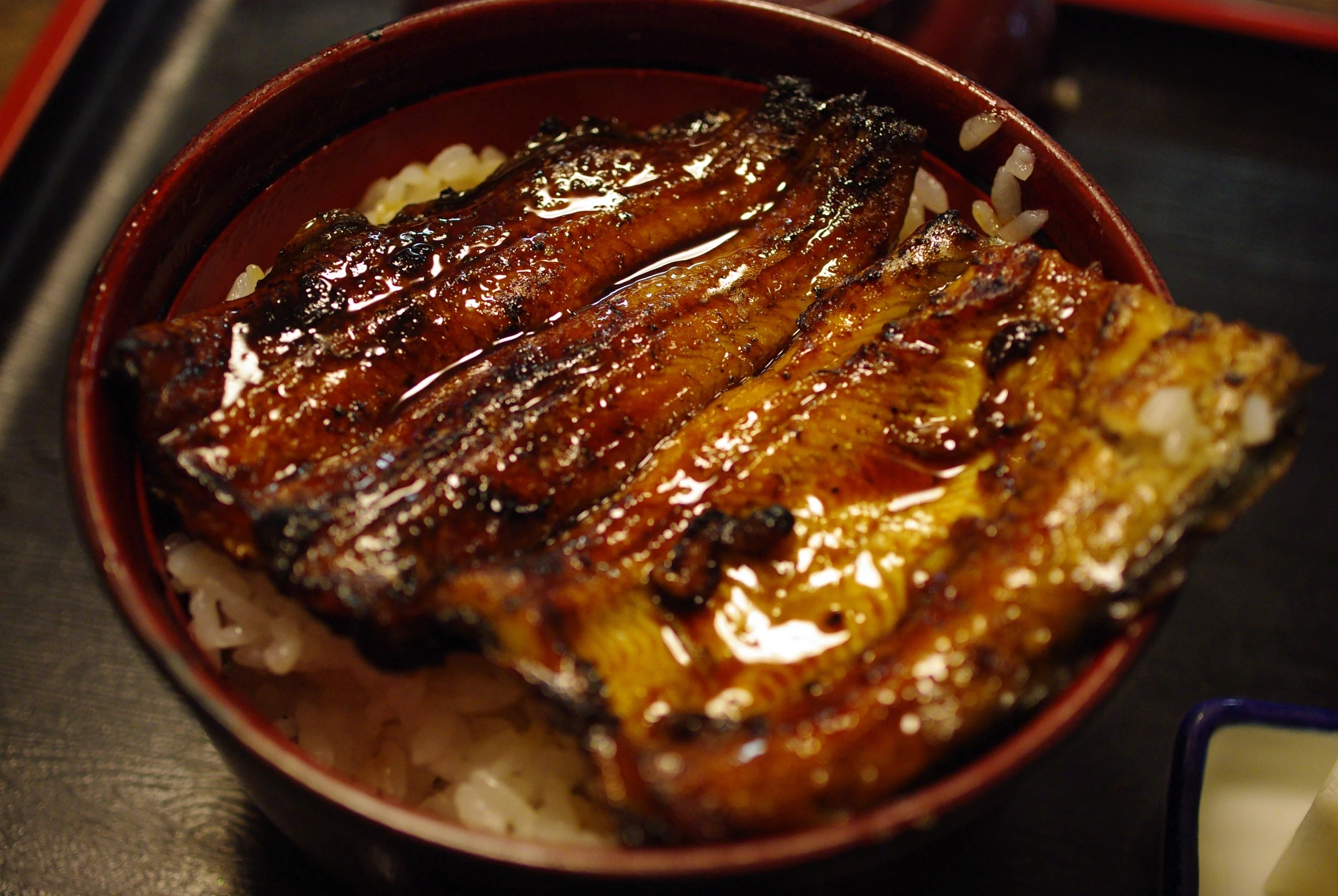 this is a steak in a bowl sitting on a plate