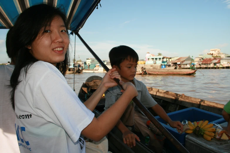 there is a woman standing on a boat with s