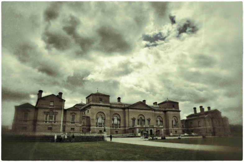 an image of a cloudy sky over a mansion