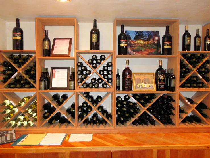 a number of bottles of wine on shelves