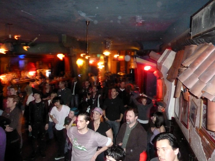 a large group of people that are standing in the street