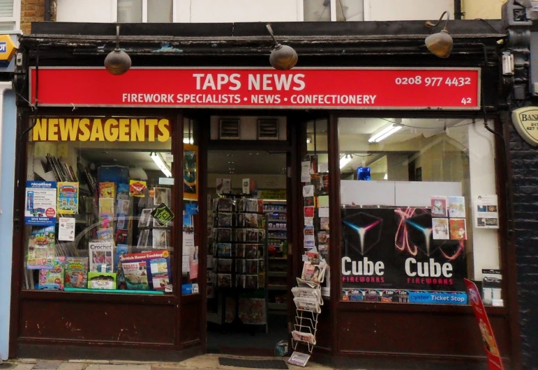 a news office sits empty as it is on the corner