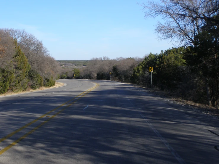 the road has two yellow lines on it