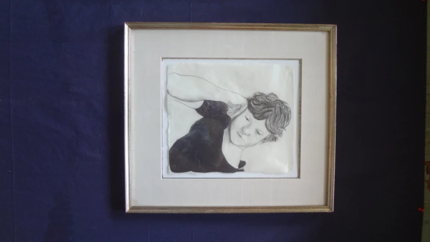framed art print titled woman portrait, hand painted on blue cloth
