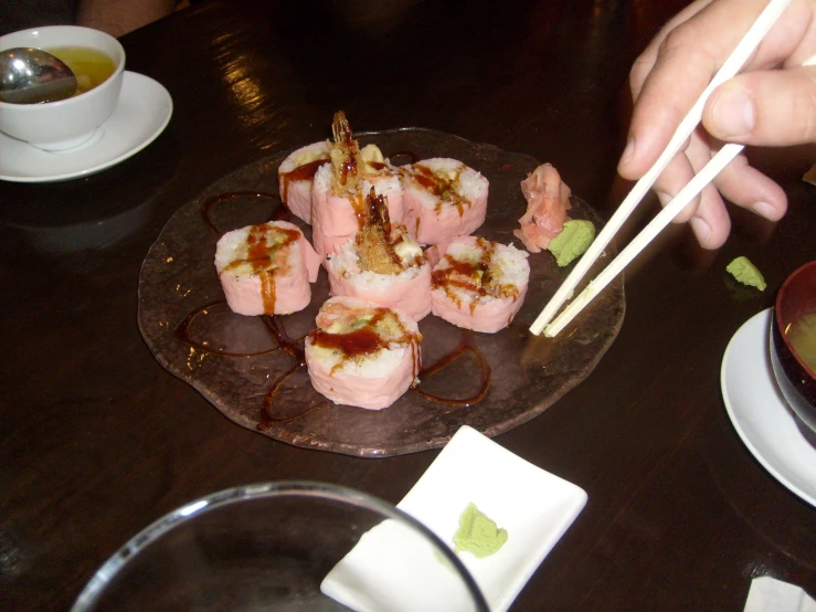 there are several different sushi on a plate