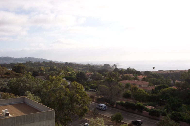 an overhead view of a freeway and a residential area