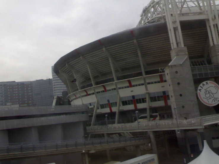 a stadium is shown with the building behind it