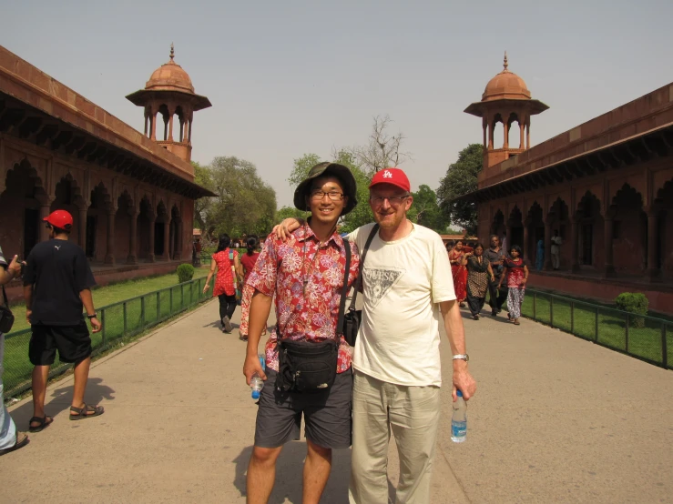 two people taking a po in a park