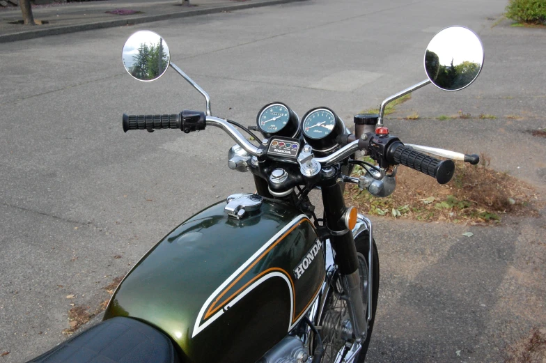 close up view of a motorcycle with mirrors