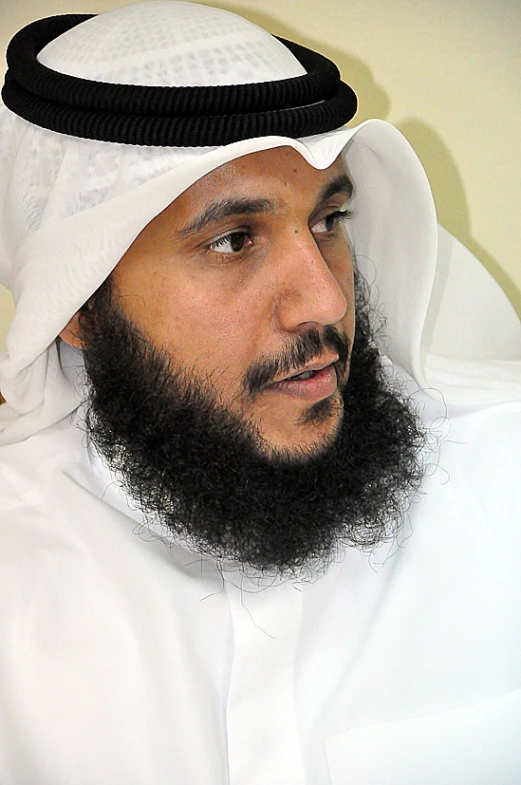 a close up of a man with a beard