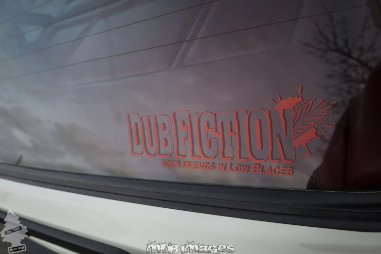 reflection of the red text on the side of the van