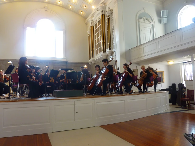 a string ensemble on display in a large room