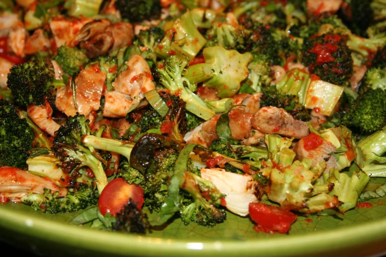 a big green plate filled with various types of foods