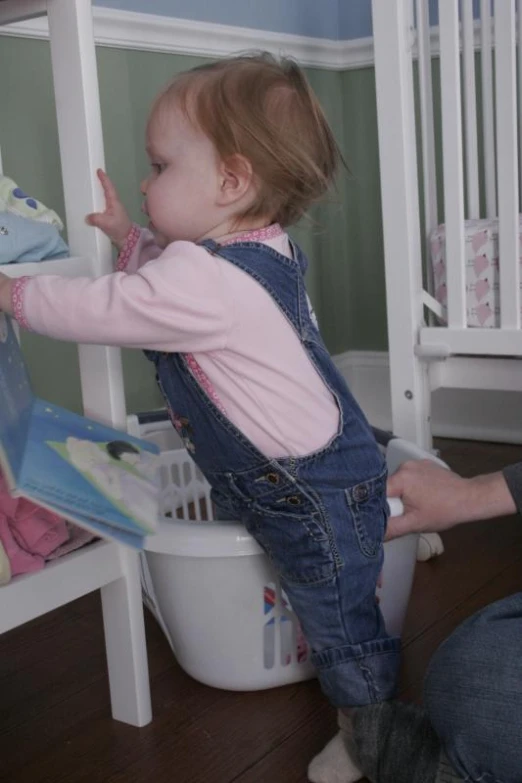 a little girl that is standing up