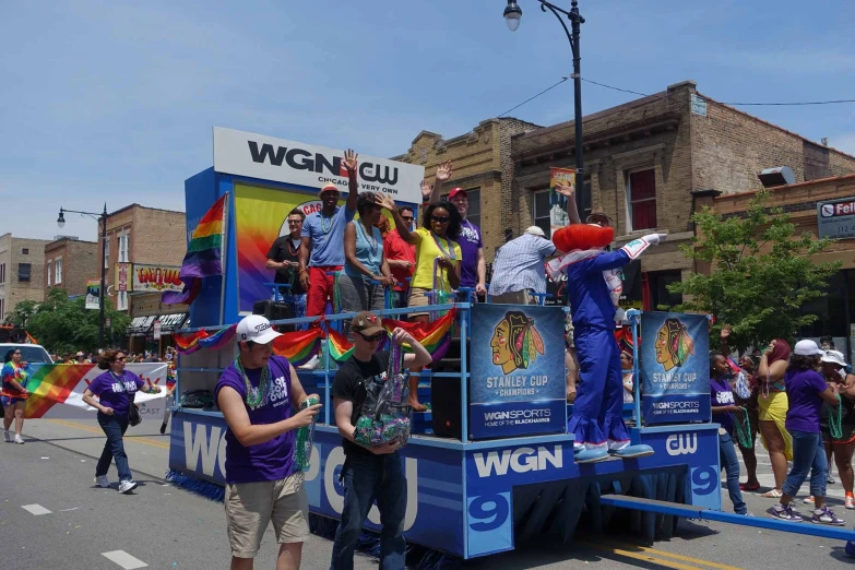 a float in the street in front of some people