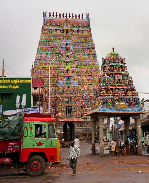 there is a very big colorful structure going on the street