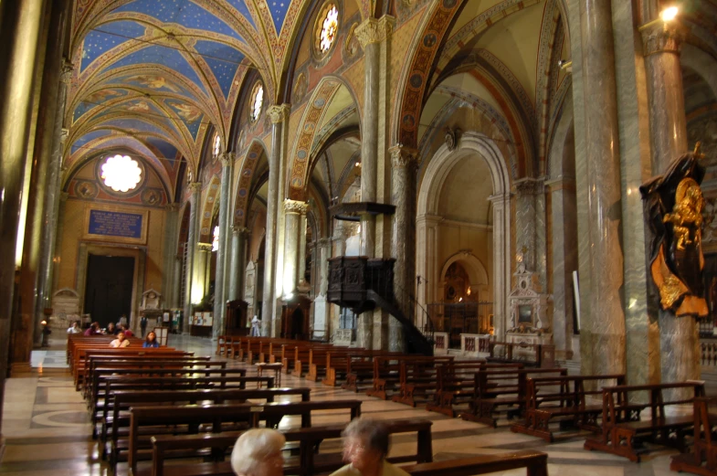 there are many benches in this large church