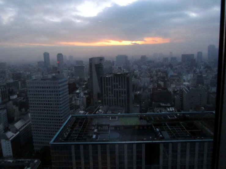 there are buildings in a big city and sky