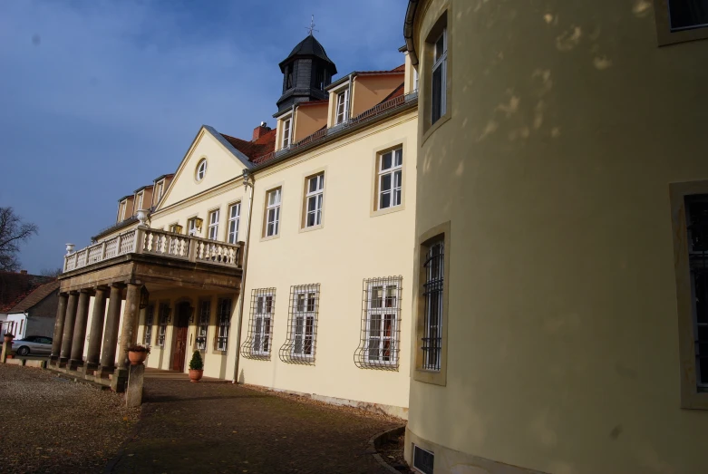 a building with columns and a tower on top of it