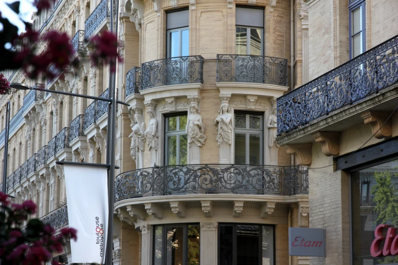 this building has a balcony with decorative design