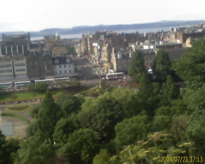 a blurred view of an entire city from the hill