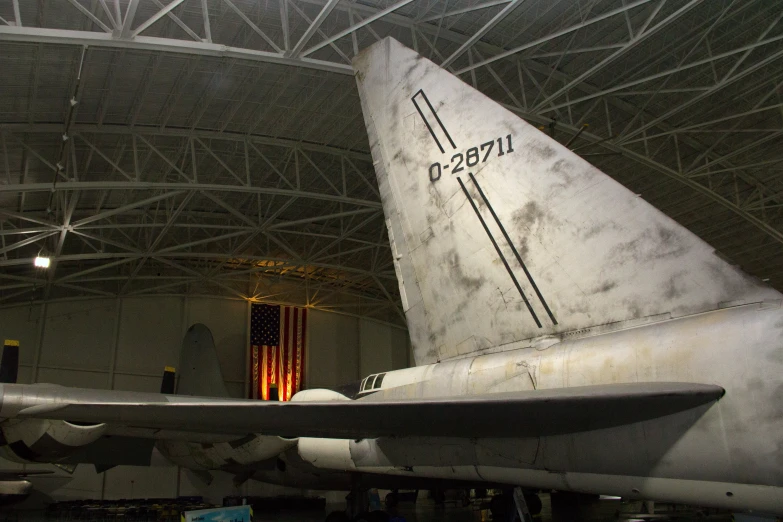 a very large jetliner sitting inside a hangar