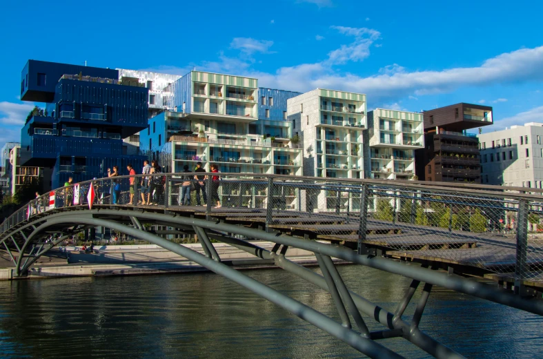 an image of people walking on a bridge