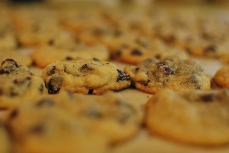 chocolate chip cookies in a bunch on top of a table