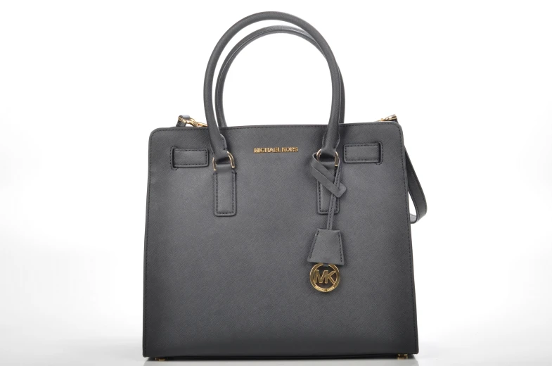 the bag is grey and has gold accents