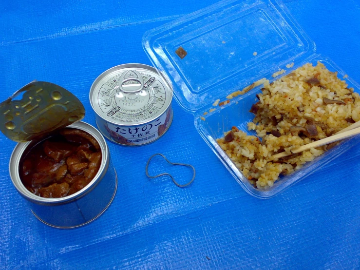 a food tray filled with rice and other food