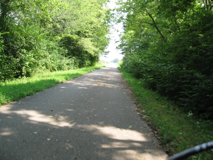 the view looking down the street at the road