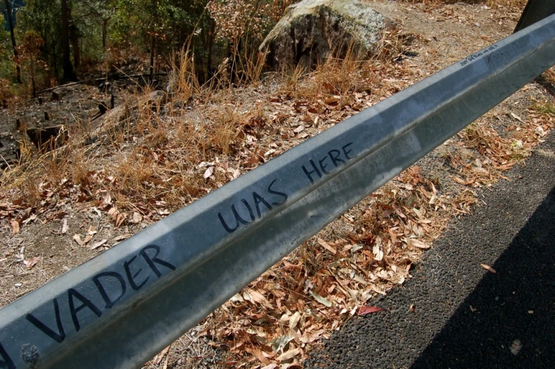 a view of a metal bar with writing on it