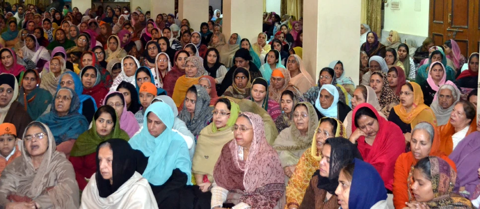 an image of several different people sitting in a group