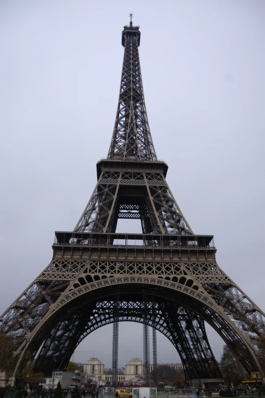 the view of the eiffel tower on a very cloudy day