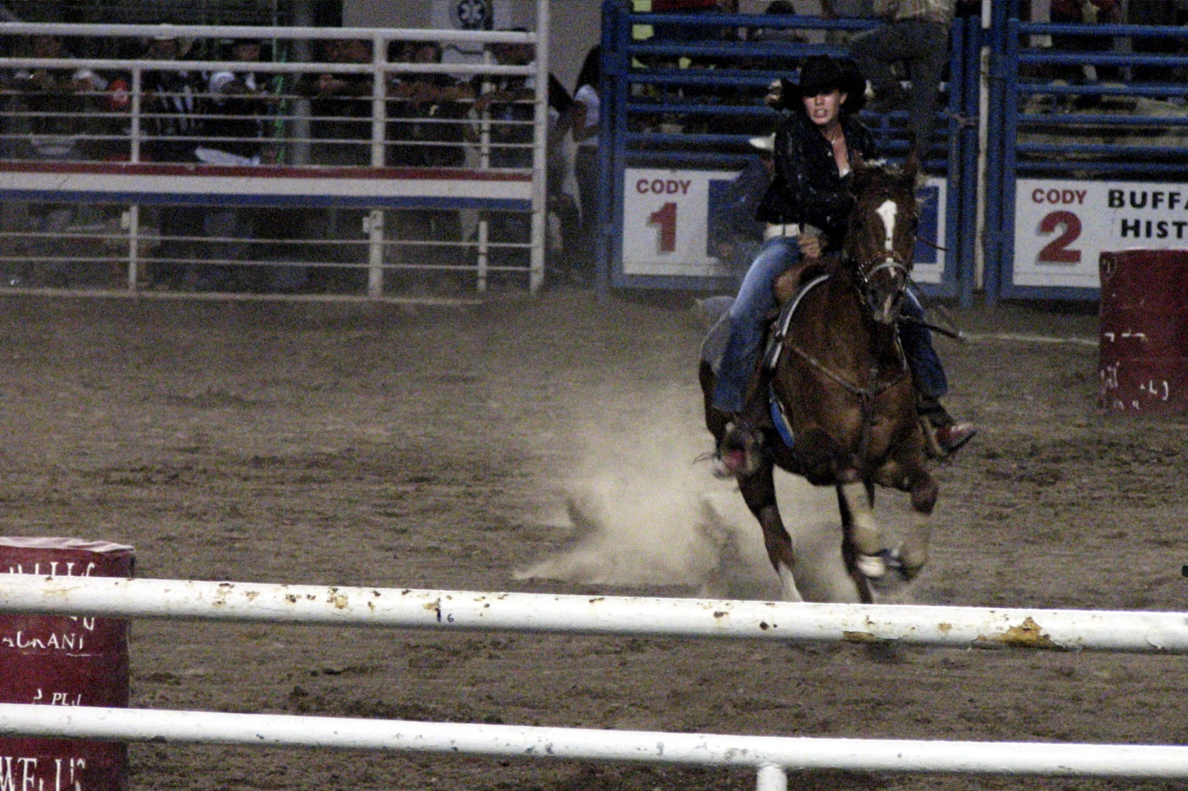 a woman that is riding a horse around