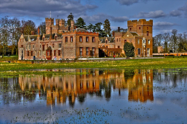 the reflection of a castle in the water