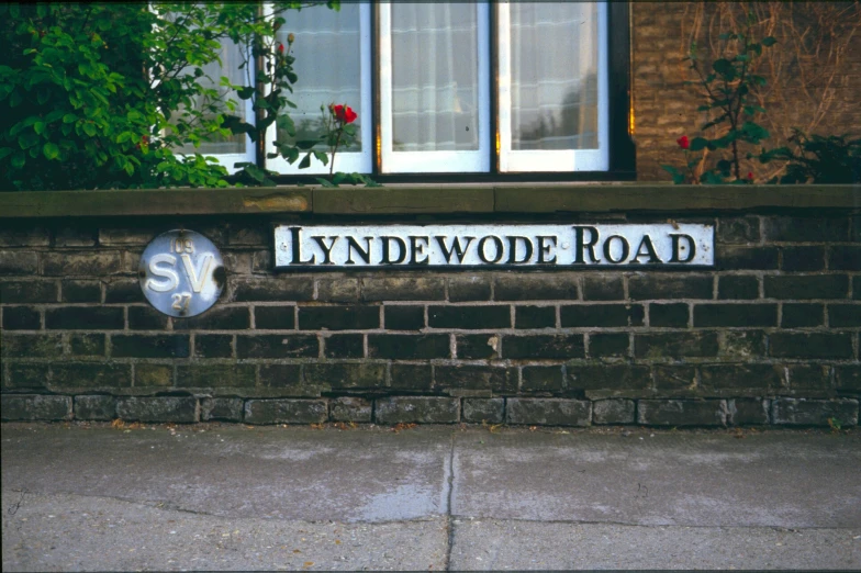 the sign of lyndewvelde road on the outside wall