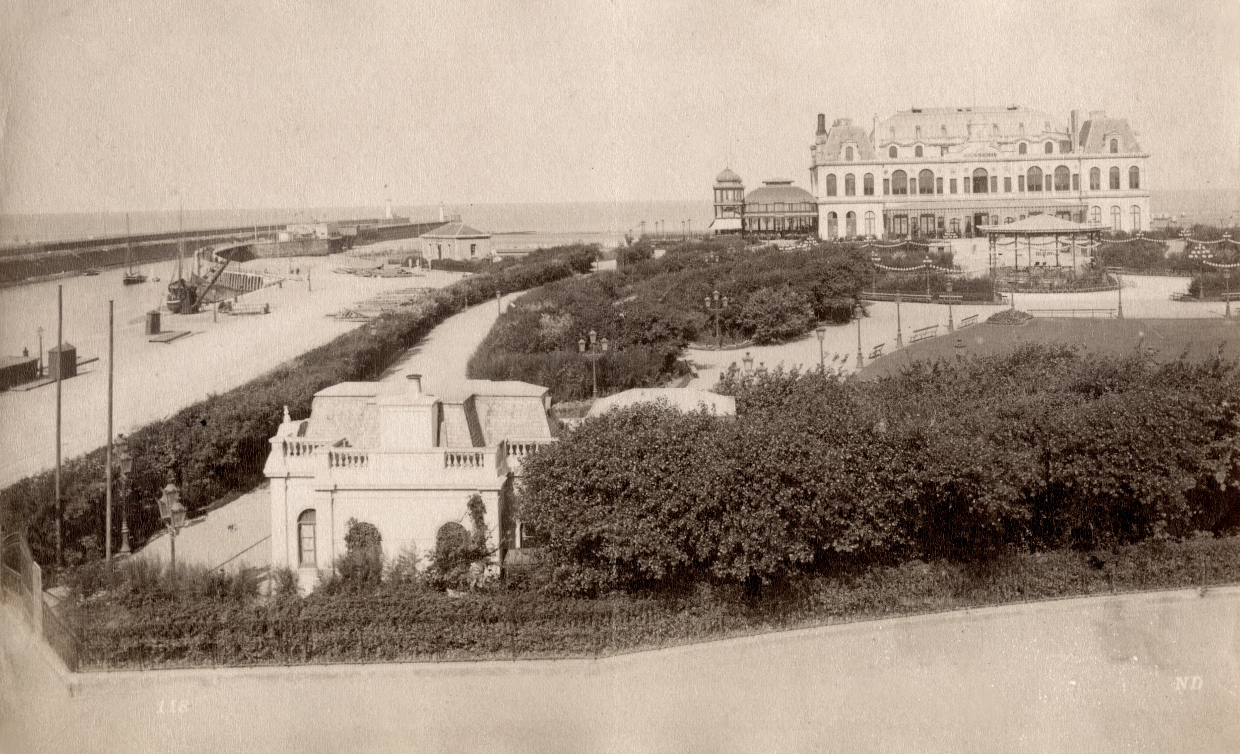 an aerial s of a mansion near the ocean