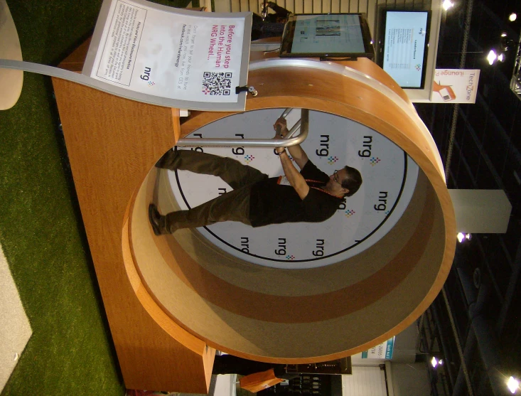 a man standing inside of a very big clock