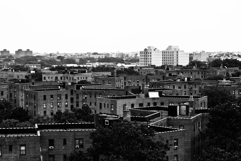 a large city filled with tall buildings covered in dark clouds