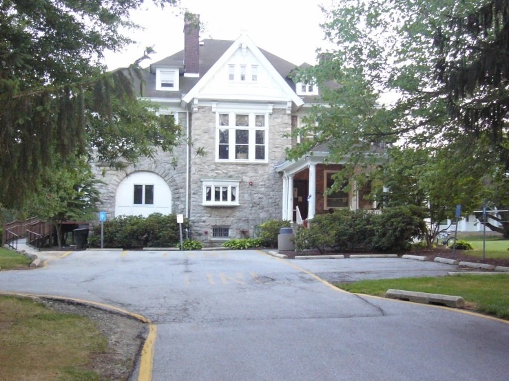 a house with a white roof and two windows