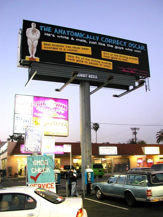 a billboard in the city advertising a performance