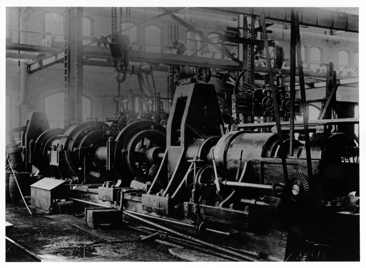 black and white pograph of steam pipes in a factory