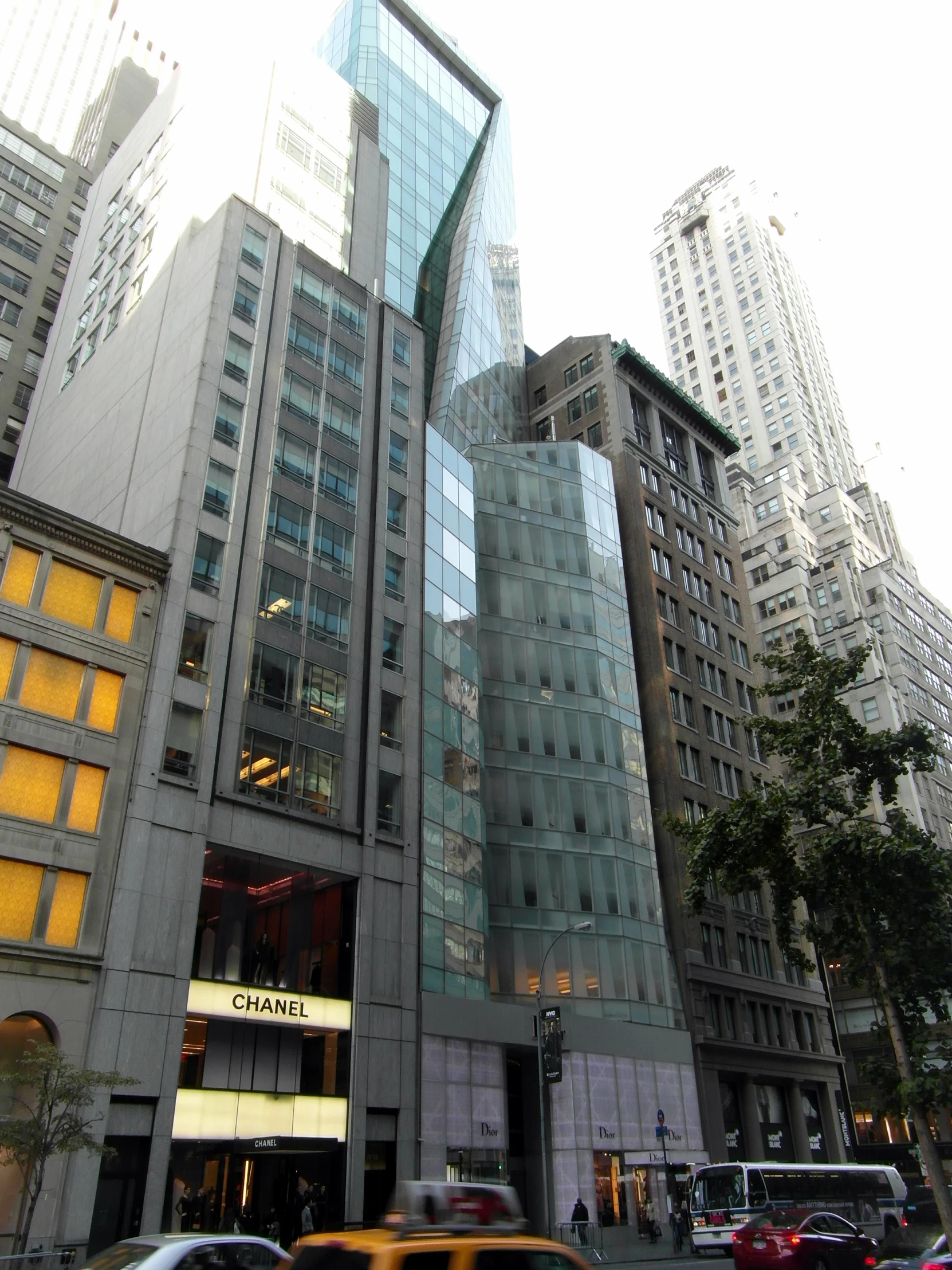 a view of the intersection of two buildings in new york