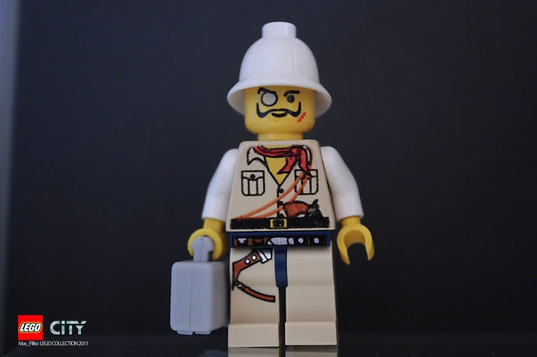 a lego figure that is wearing a helmet and glasses