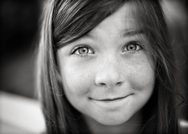 a close up of a young person with freckled hair