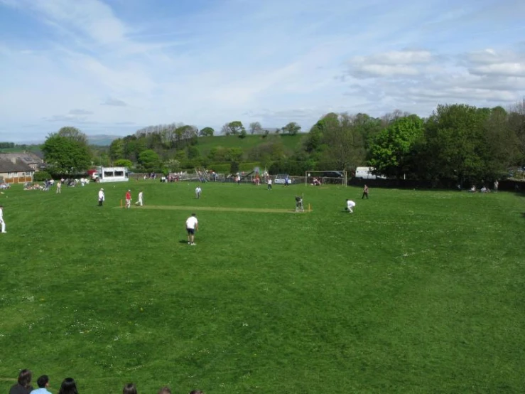 a crowd of people in a large open field