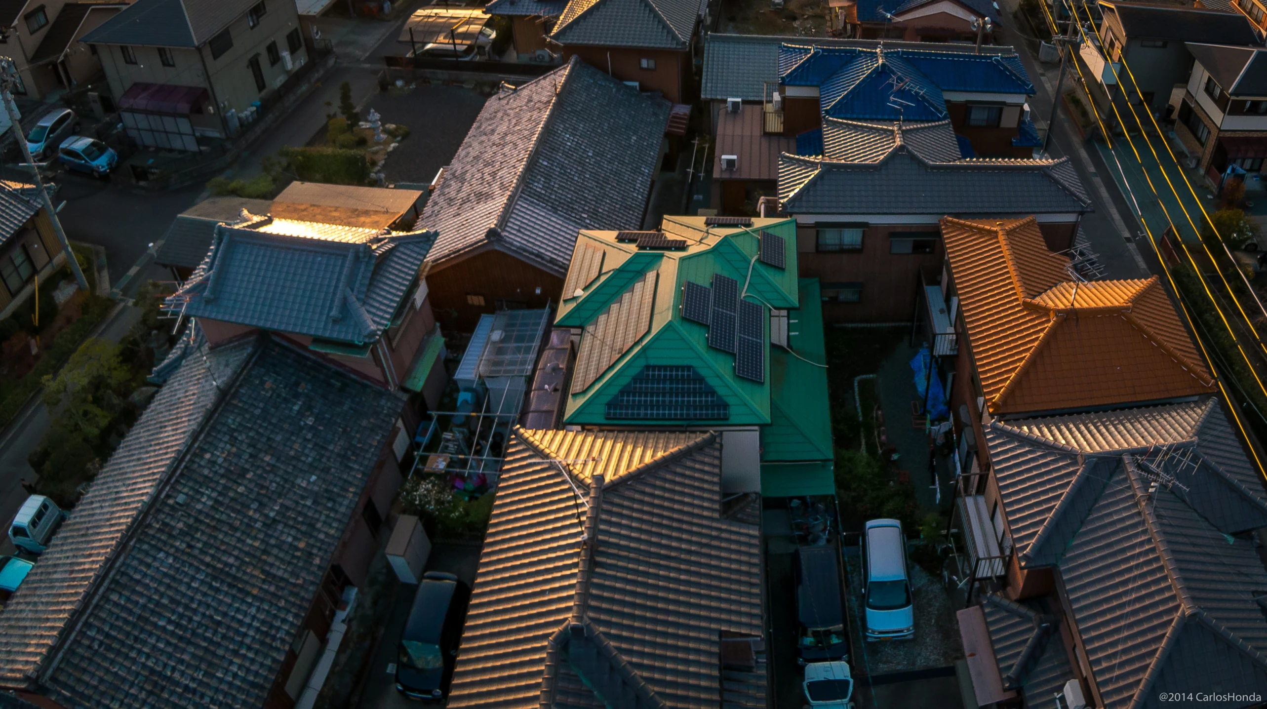 a view from the top of houses in an urban area