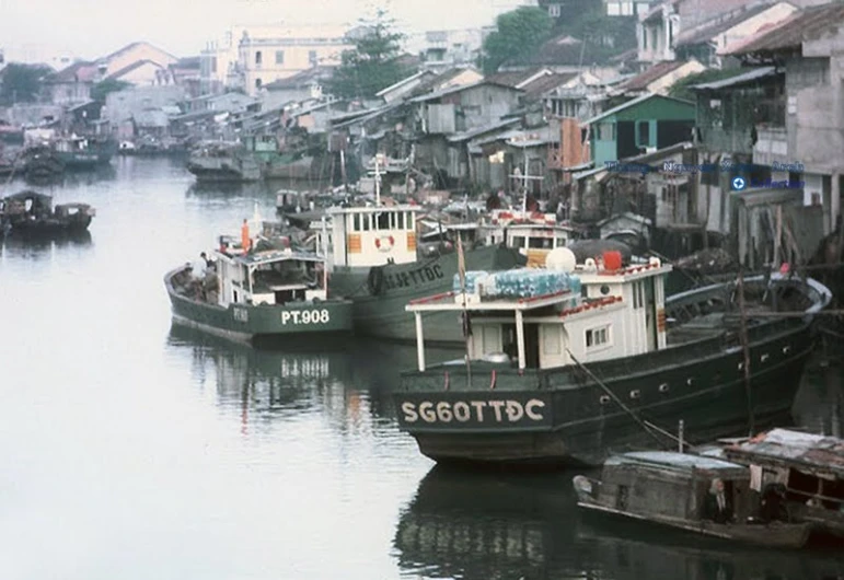 a city with some very big boats in the water